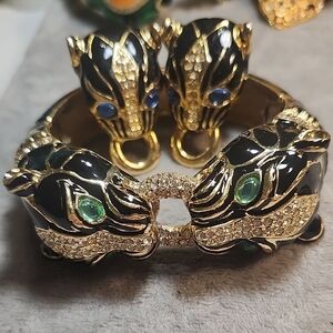 Gold Tone Black Enamel Panther Bracelet with Green and Clear Stones